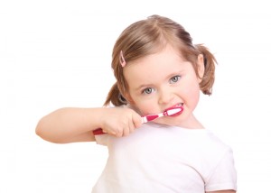 girl brushing teeth