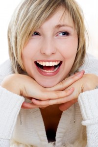 Blond Woman with Beautiful Porcelain Veneers